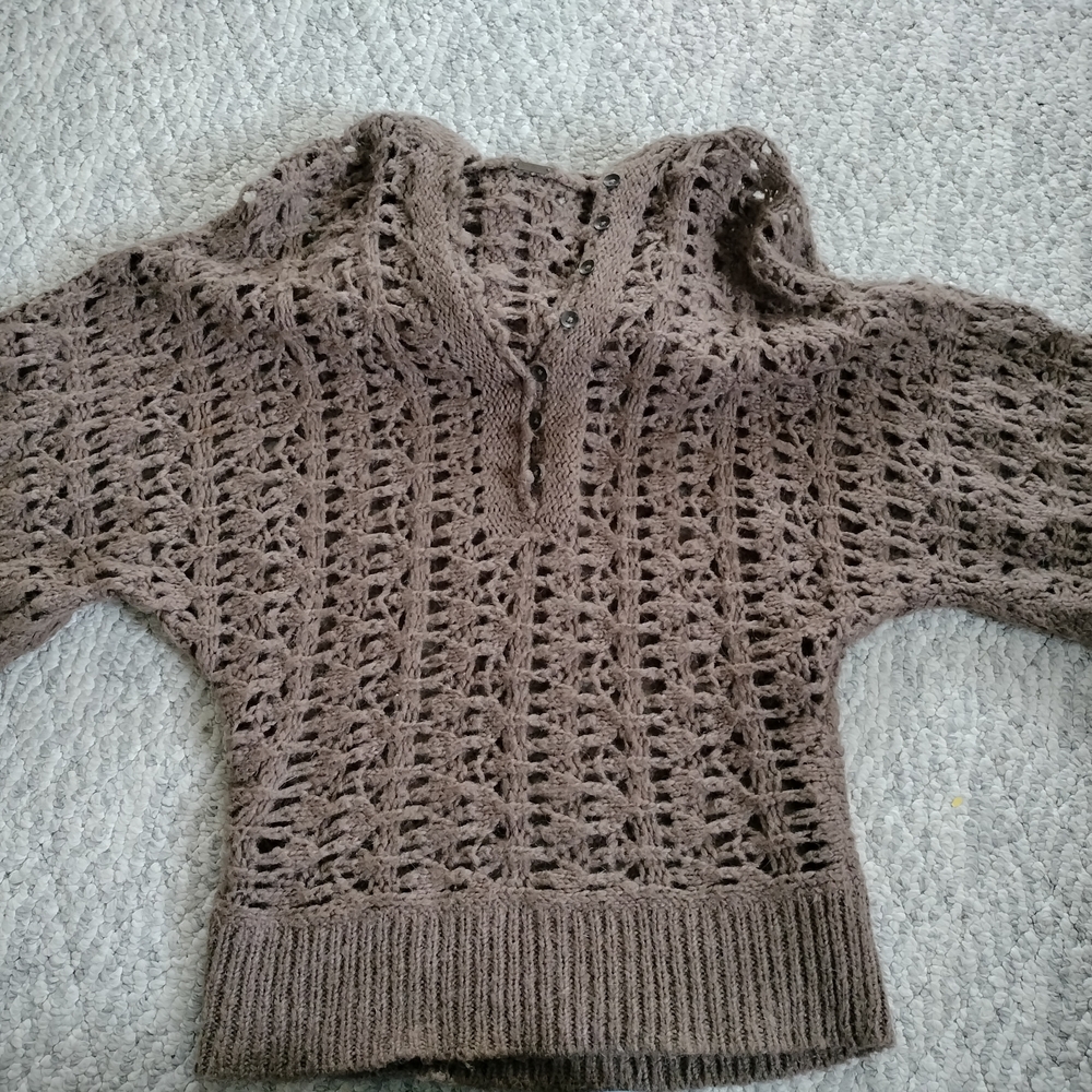 This is a Free People Pointelle Open Knit Alpaca Hooded Sweater in brown. Small - Picture 10 of 13